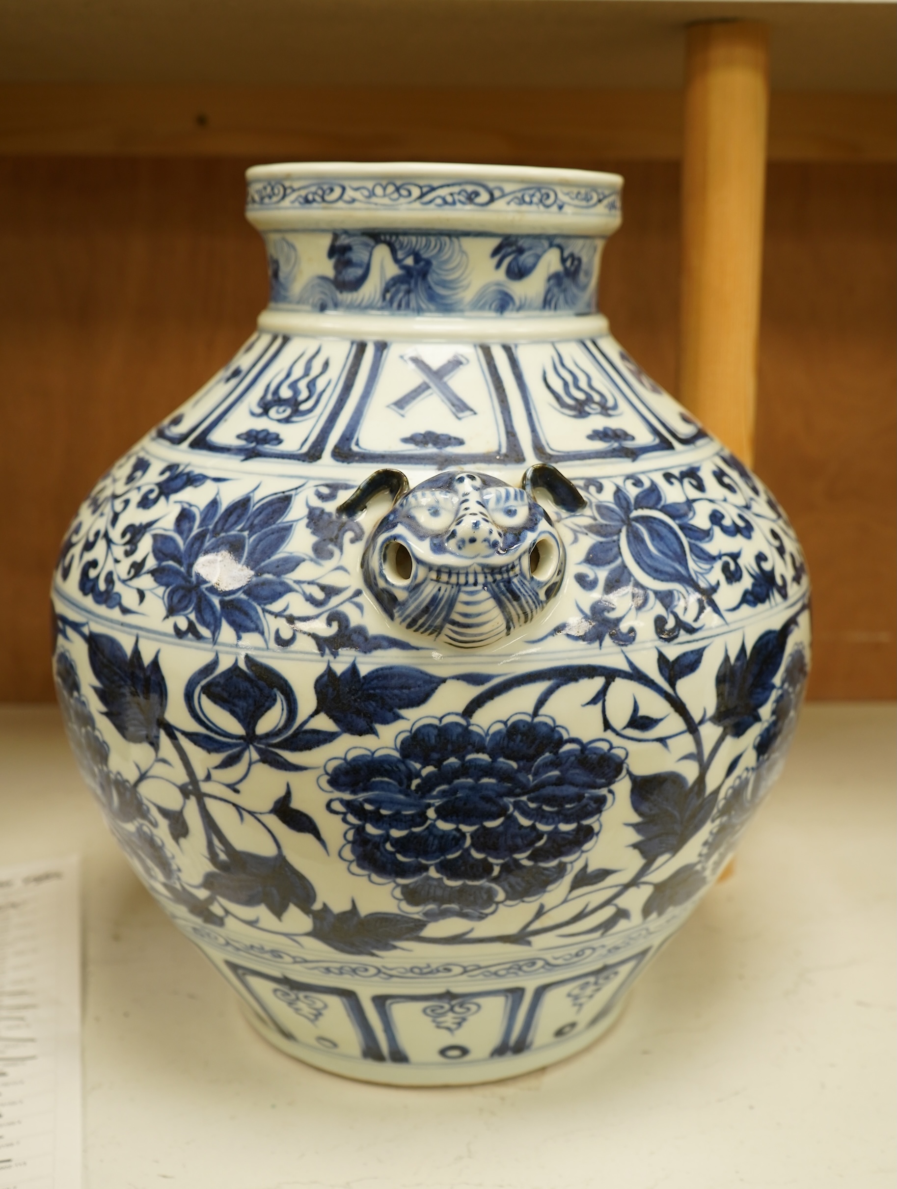 A Chinese blue and white pot vase with zoological handles, 38cm high